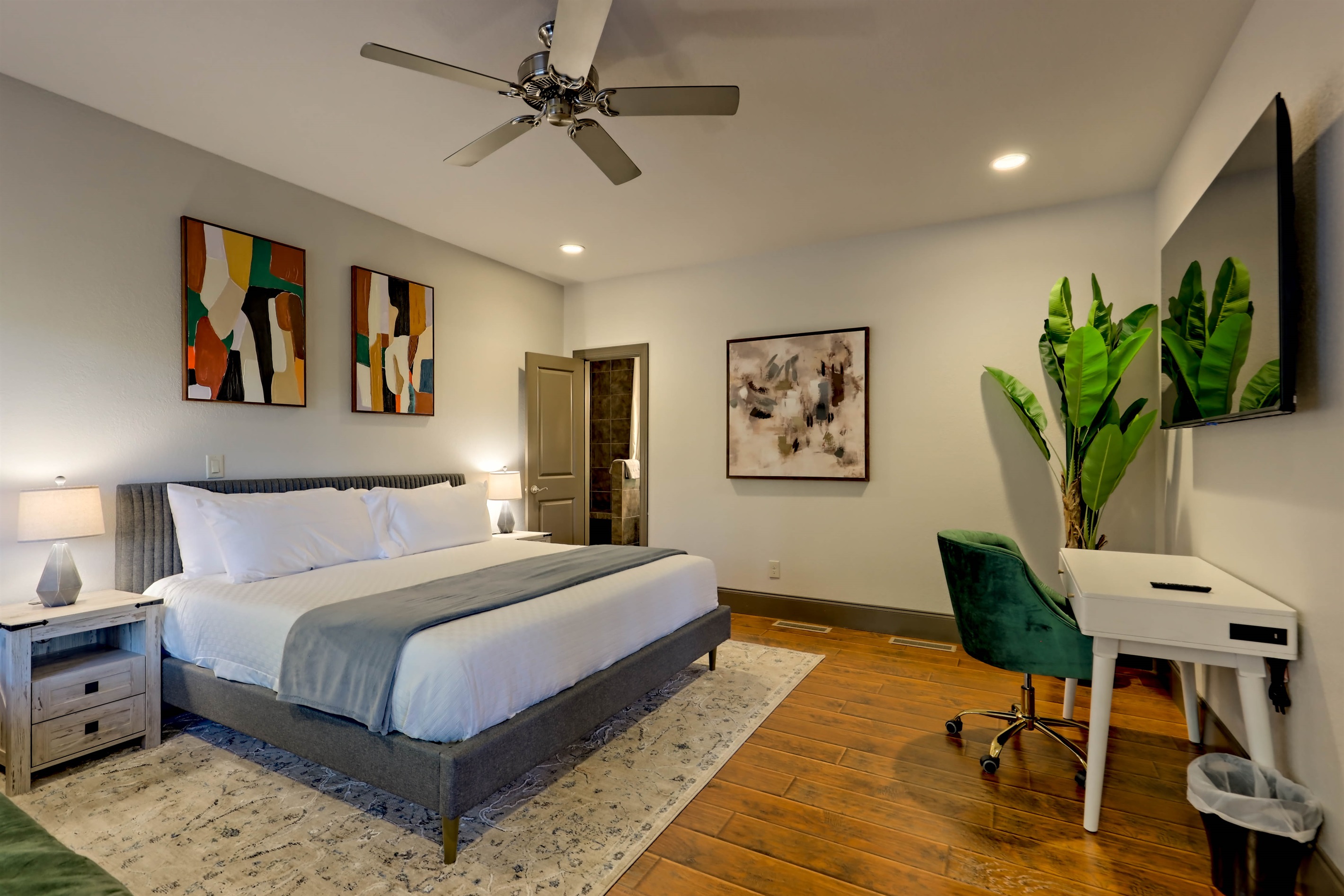 1st-floor master king bedroom with en suite bathroom and a queen sofa bed.