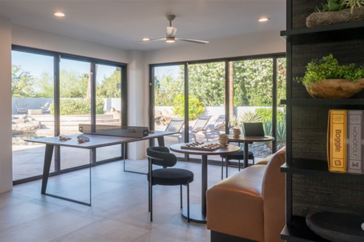 Ping pong in the game room flex lounge makes this home the perfect vacation for all ages.