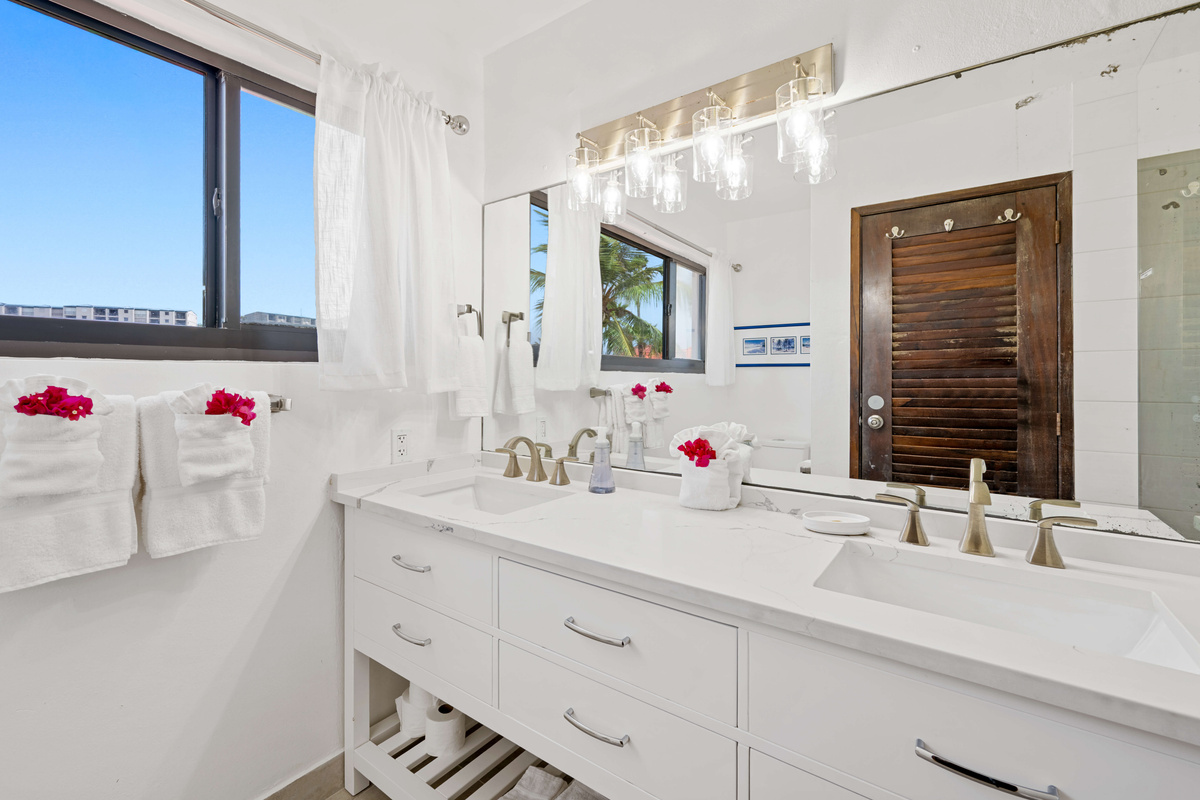 A relaxing private bathroom space to start and end your island days.