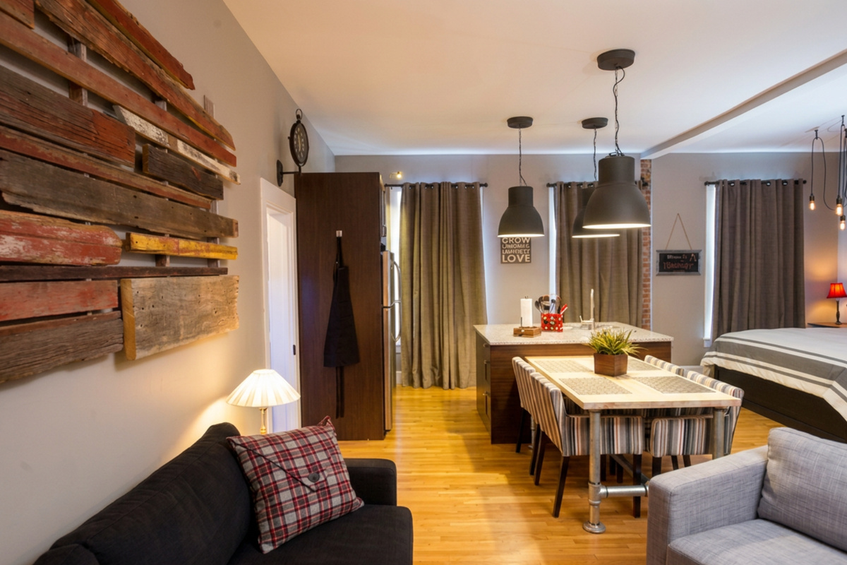 Walk just a few steps from the sofa to the fully-equipped kitchen inside the historic Vetehuset - Plantera