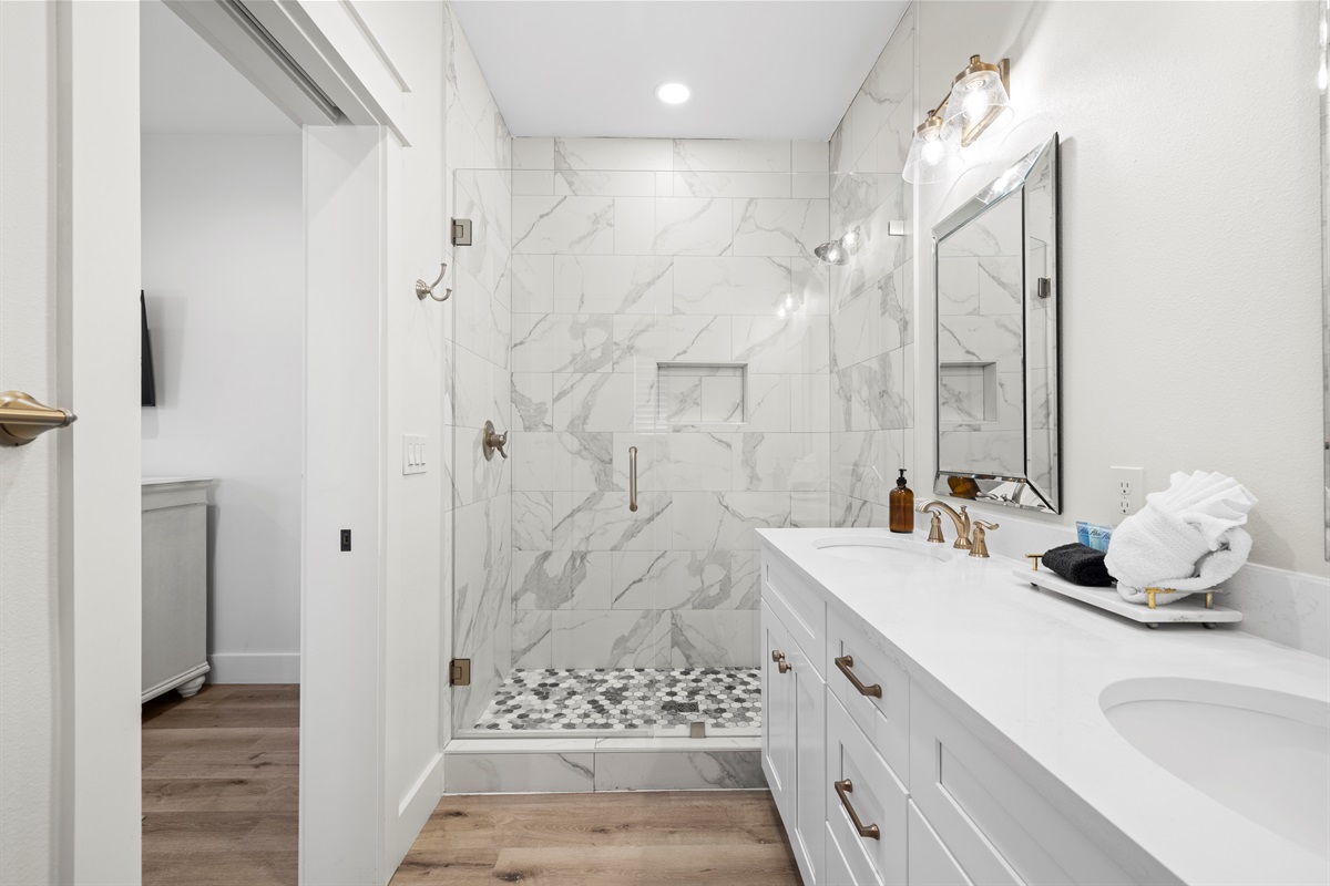 2nd Floor Bathroom 5 has a double vanity, custom walk in shower and a separate water closet