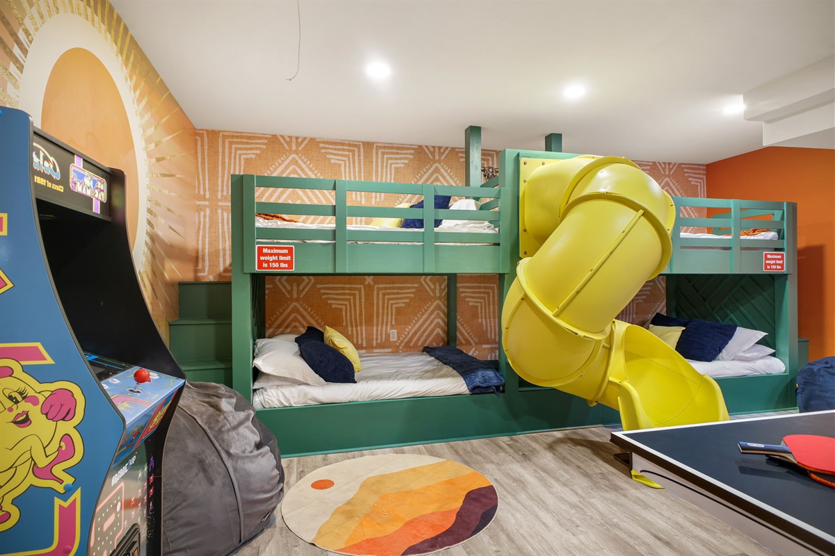 Bedroom 5 / Games Room: Two full-over-full bunks sleep up to 8 guests in comfort.