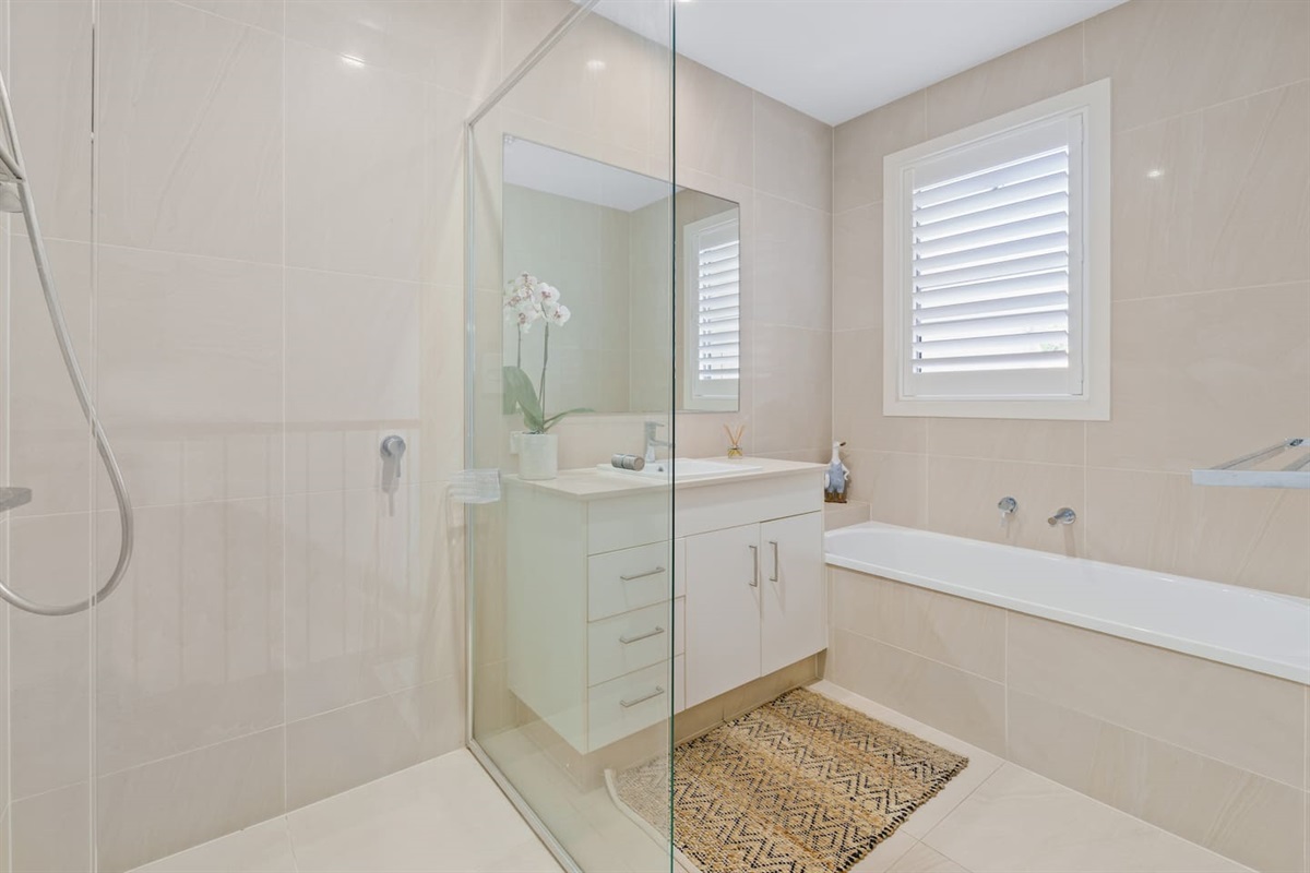 Main Bathroom with bath and shower