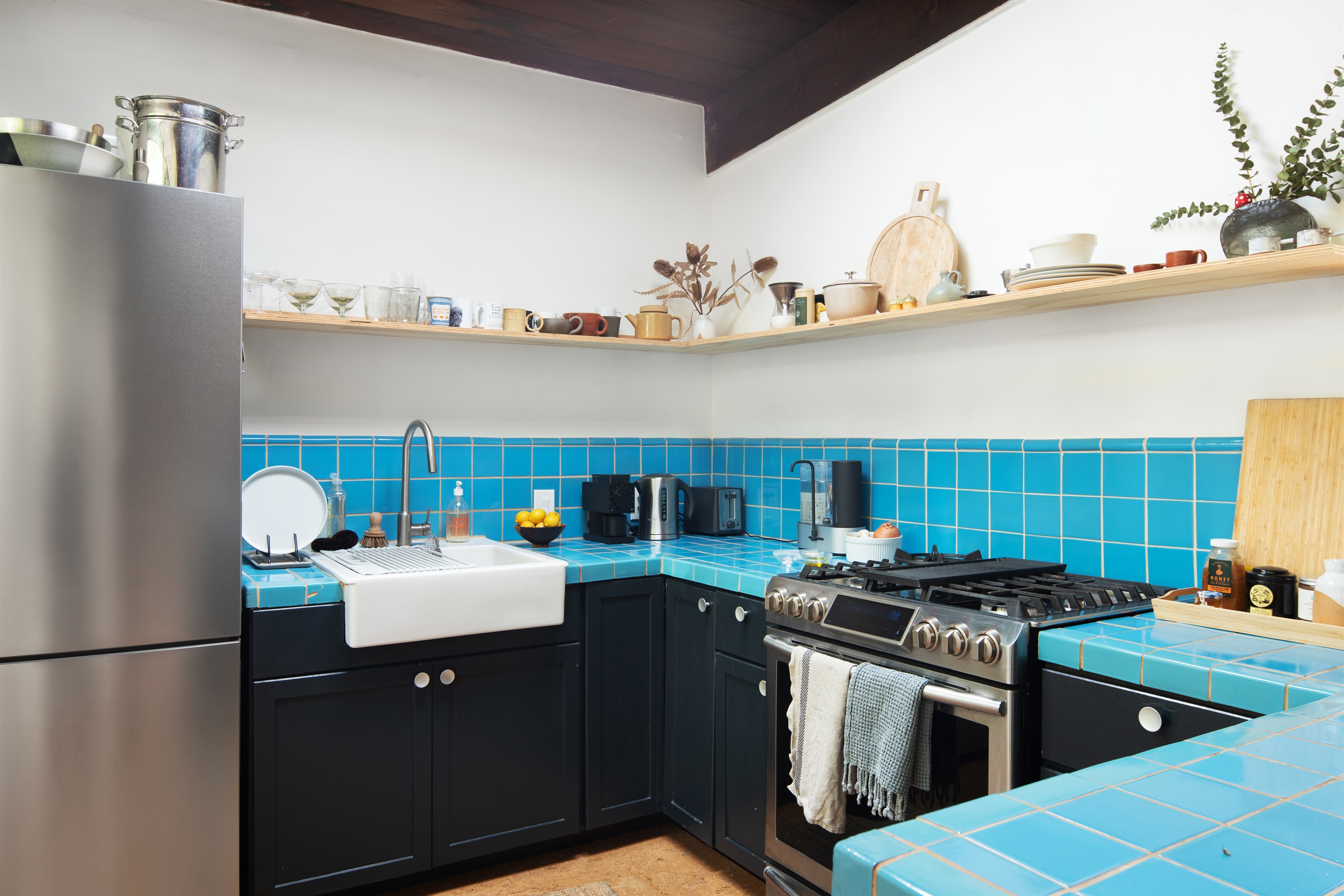 "Chic Culinary Haven: Fully Equipped Kitchen with a Dash of Retro Charm"