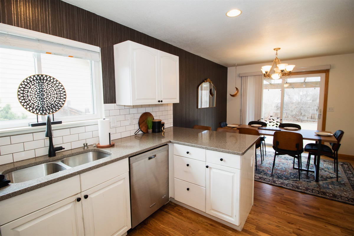 Warm kitchen stocked with coffee, flour, spices, cooking oil, and all of the essentials! All you need are the groceries.