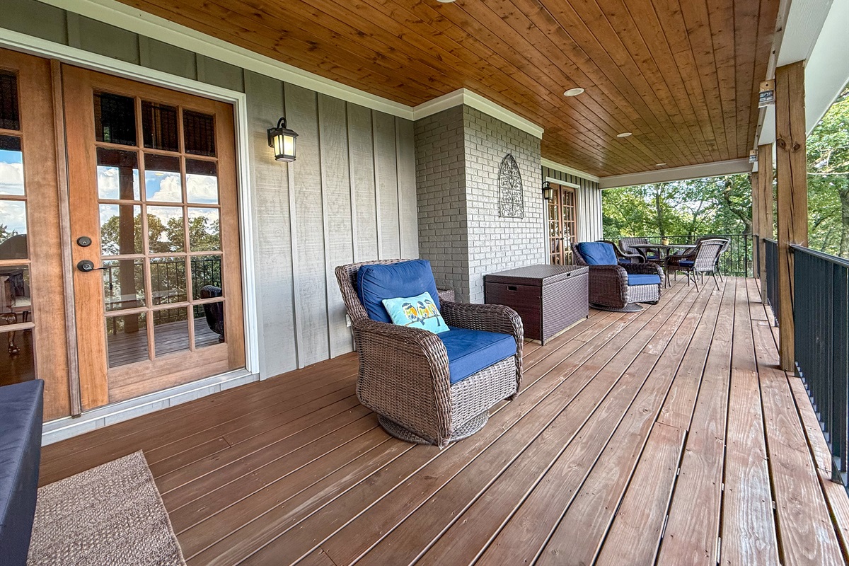 Enjoy the stunning North Georgia mountain views from the large porch, where plenty of comfortable seating awaits