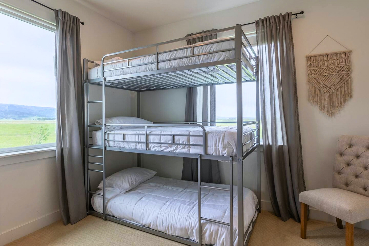 Bunk Room 2 is equipped with a triple twin bunk—perfect for kids