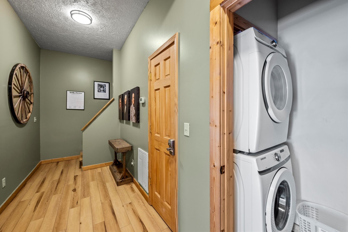 The laundry room is located near the king suites downstairs. Laundry detergent is provided.