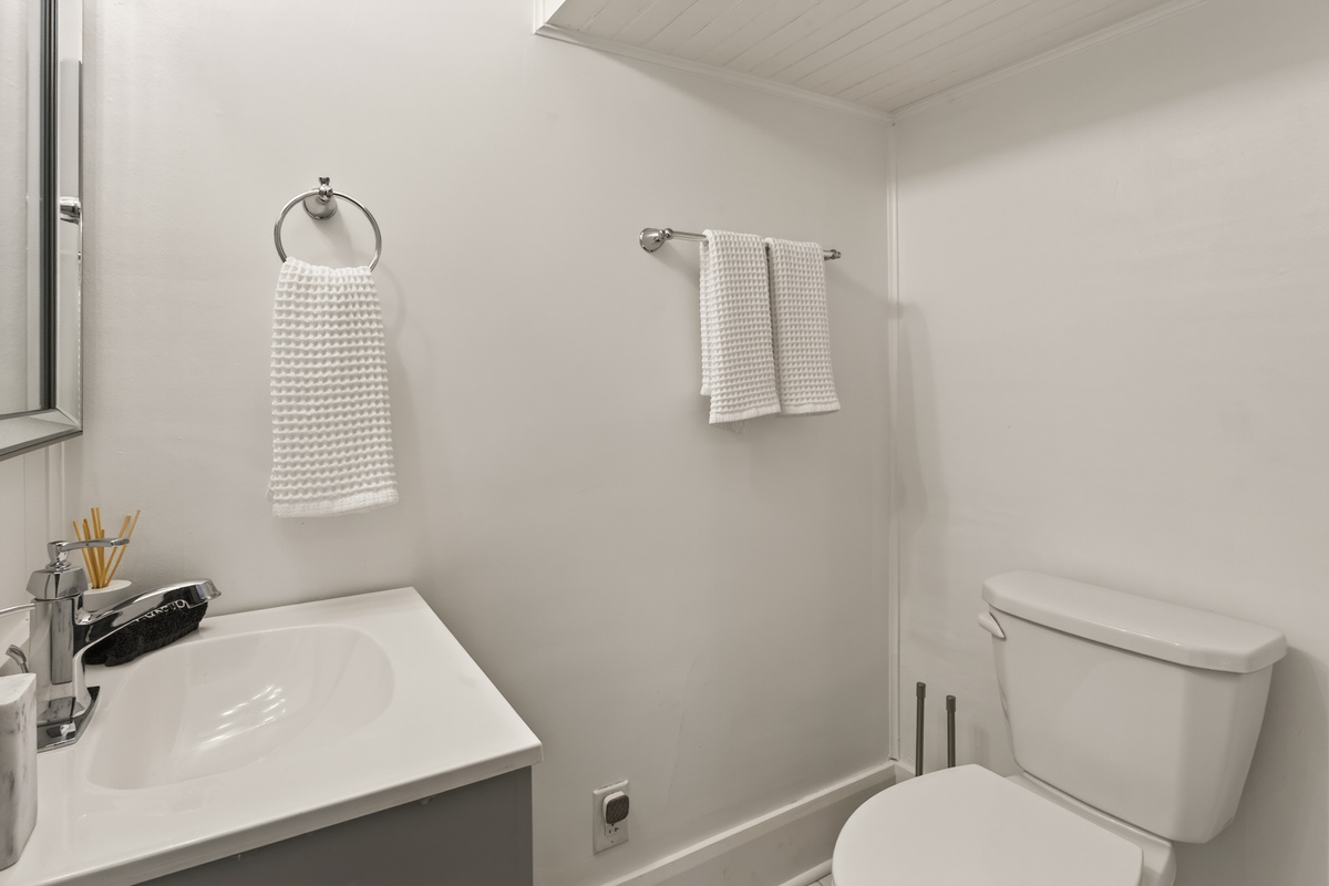 Bathroom with white sink and bathtub