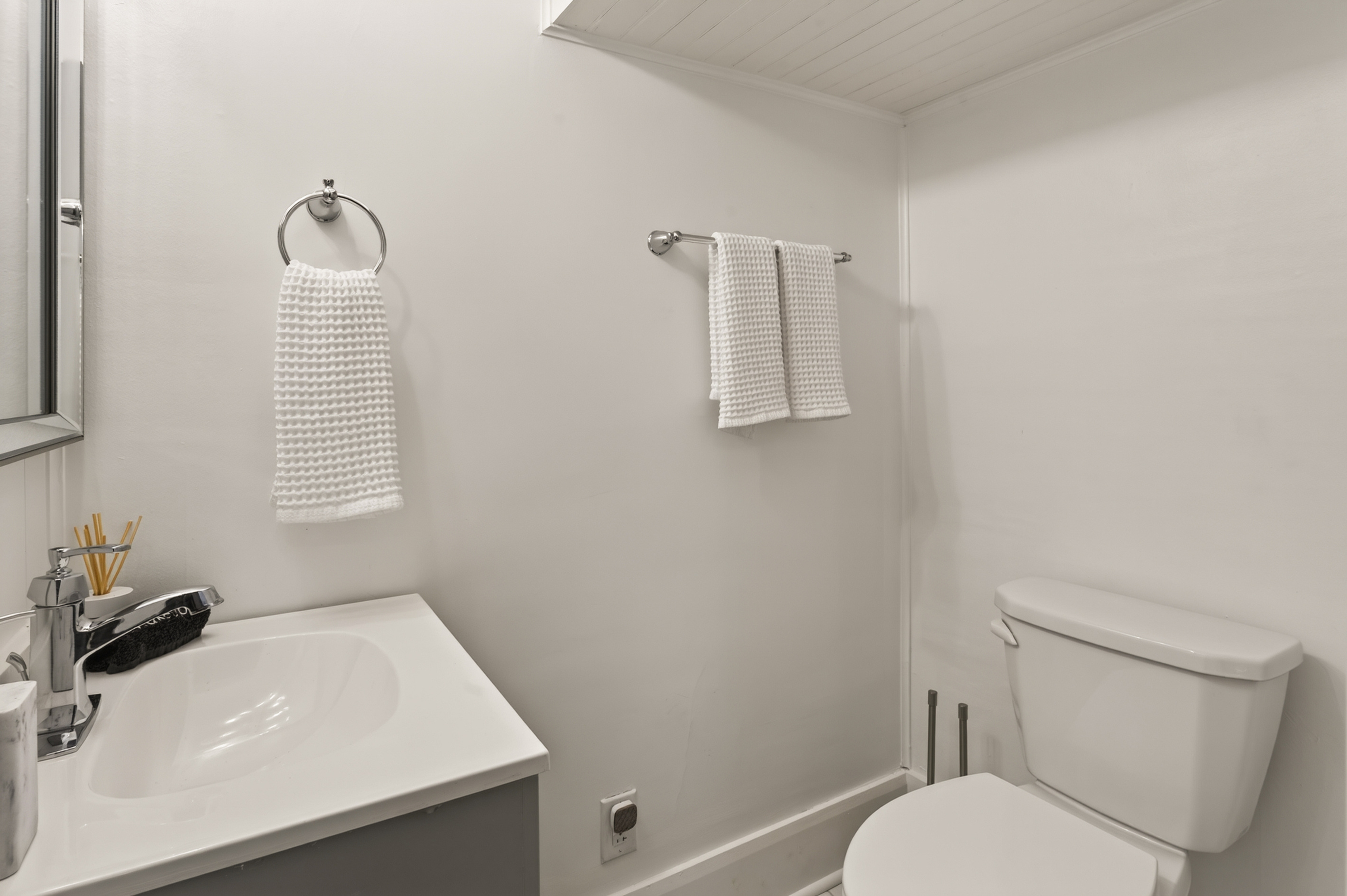 Bathroom with white sink and bathtub
