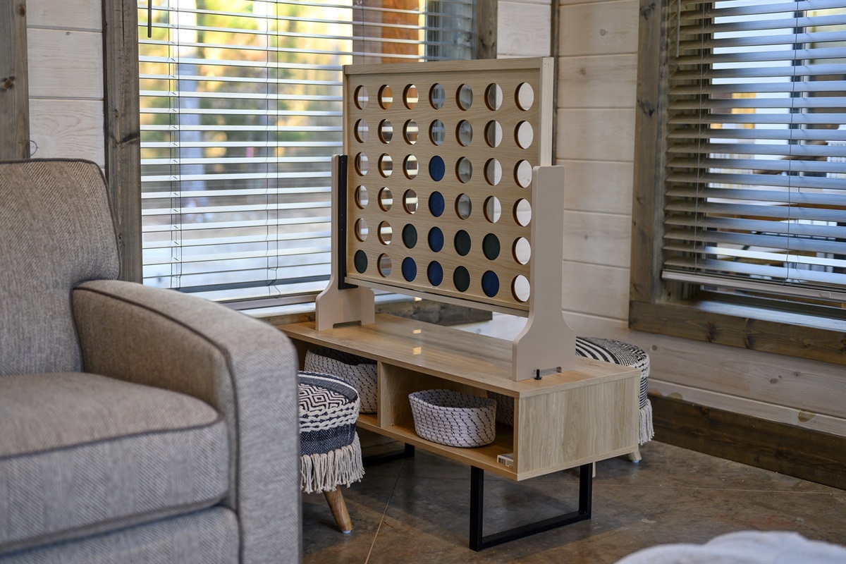 Simple joys and classic fun 🎯 Gather for a round of giant Connect Four and unwind together in the cozy game nook.