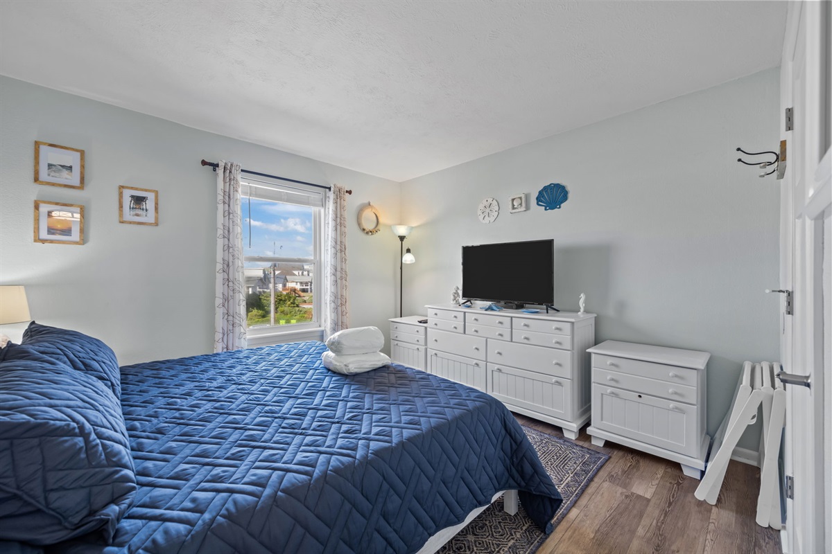 Wake up to natural light and coastal views from the comfort of your king bedroom