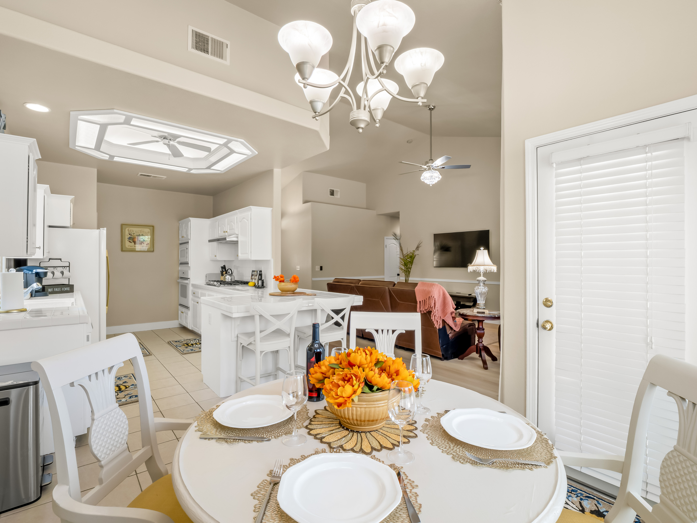 Enjoy meals together in this bright dining area that seamlessly connects to the kitchen and living room. The open layout keeps everyone connected, whether you're sharing breakfast, dinner, or planning the day's adventures.