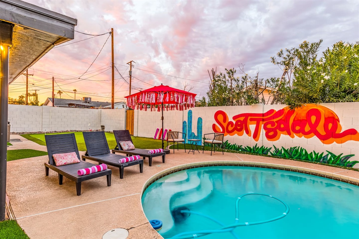 Snap the perfect vacation photo in front of the colorful "Scottsdale" mural while lounging near the pool with friends or family.

