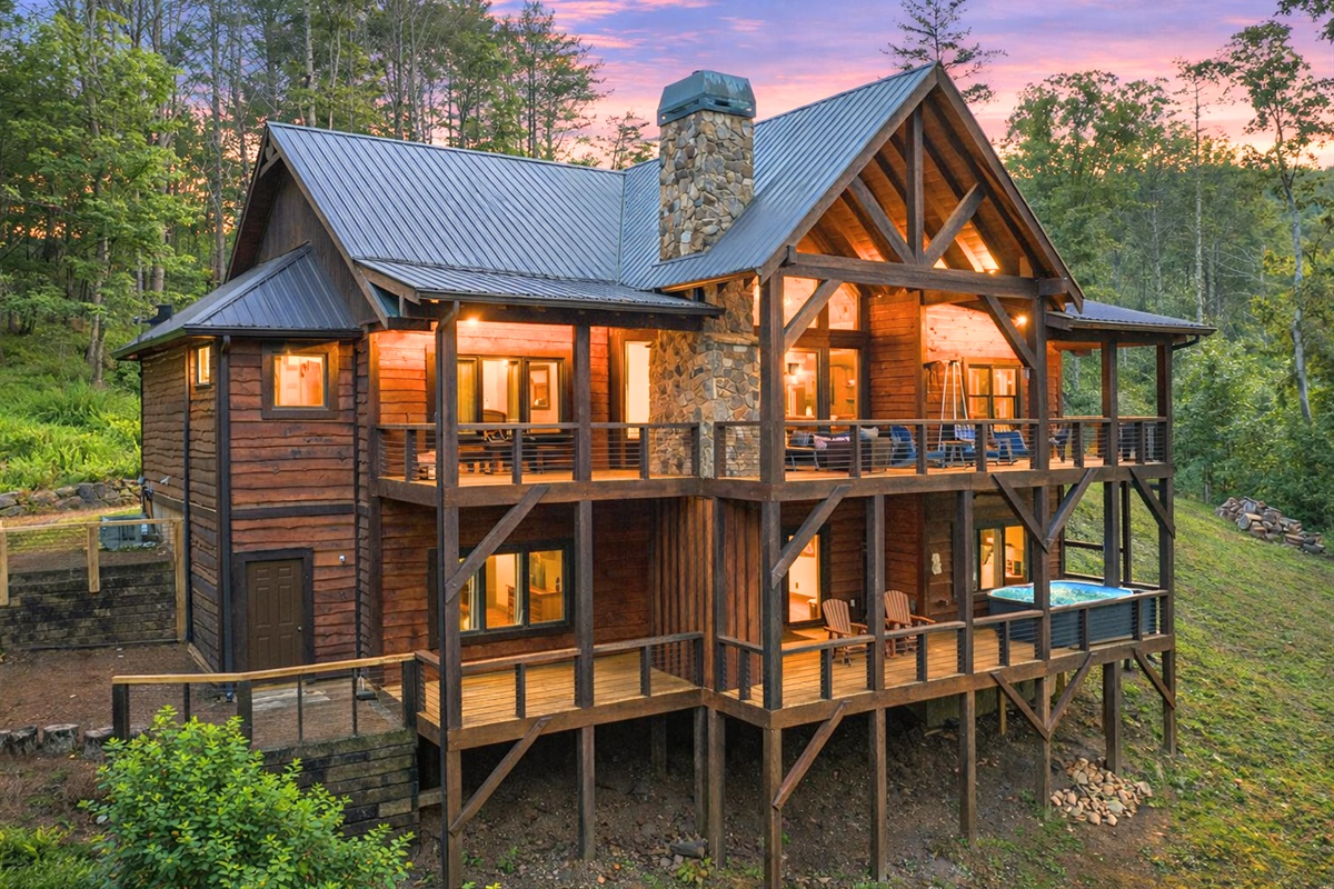 Welcome to your dream mountain retreat! Glowing warmly from within and surrounded by the peaceful beauty of the Blue Ridge forest.