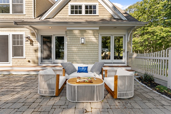 From morning brews to evening sips, this outdoor seating area has you covered