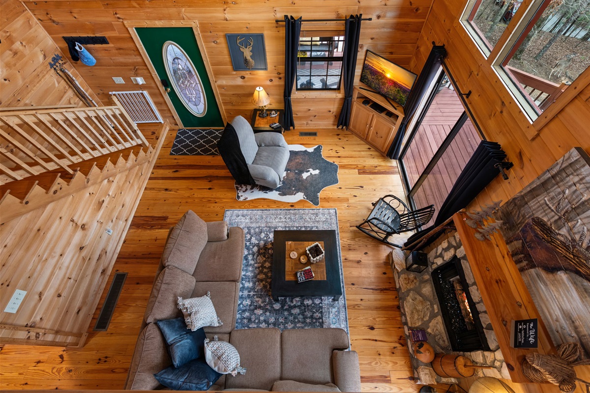 Enjoy a view of the living area right from the loft.