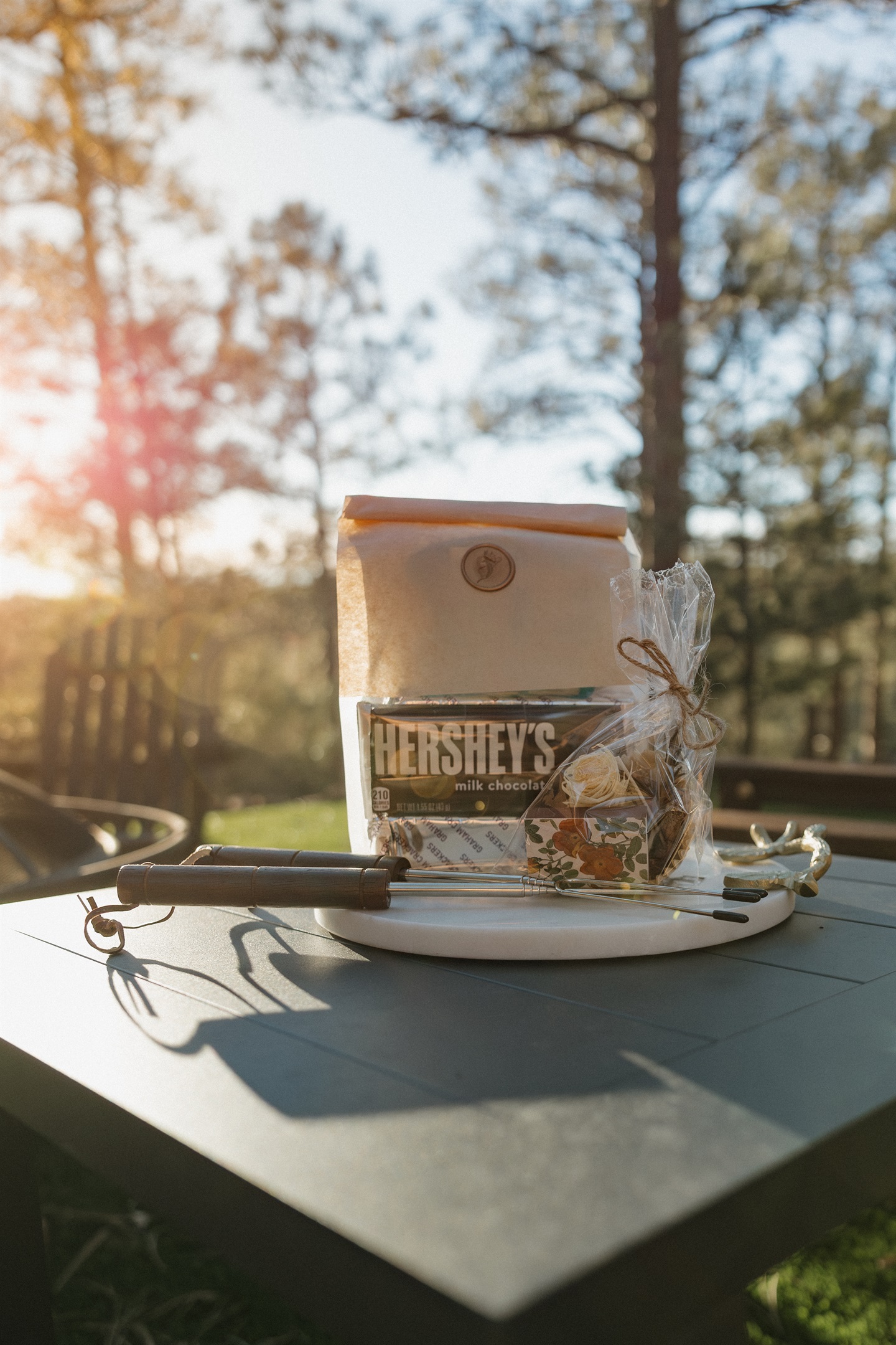 Complimentary s'mores supplies and homemade firestarters with cinnamon, rosemary, lavender, and rose petals await at Poppywood Pines. This thoughtful Show Low cabin provides everything for cozy evenings by the fire, surrounded by towering ponderosa pines.