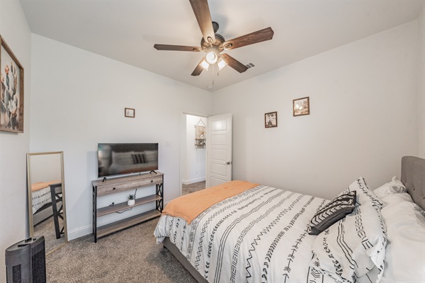 Guest bedroom #1 with queen bed and smart TV