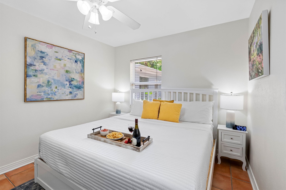 This bedroom brings together modern comforts and artistic flair.