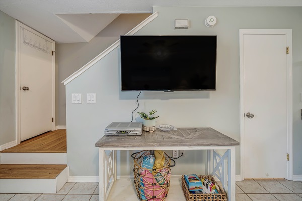 Relax in the living room with our ROKU TV. Beach towels are available for your use - just toss them into the beach wagon on your way out!