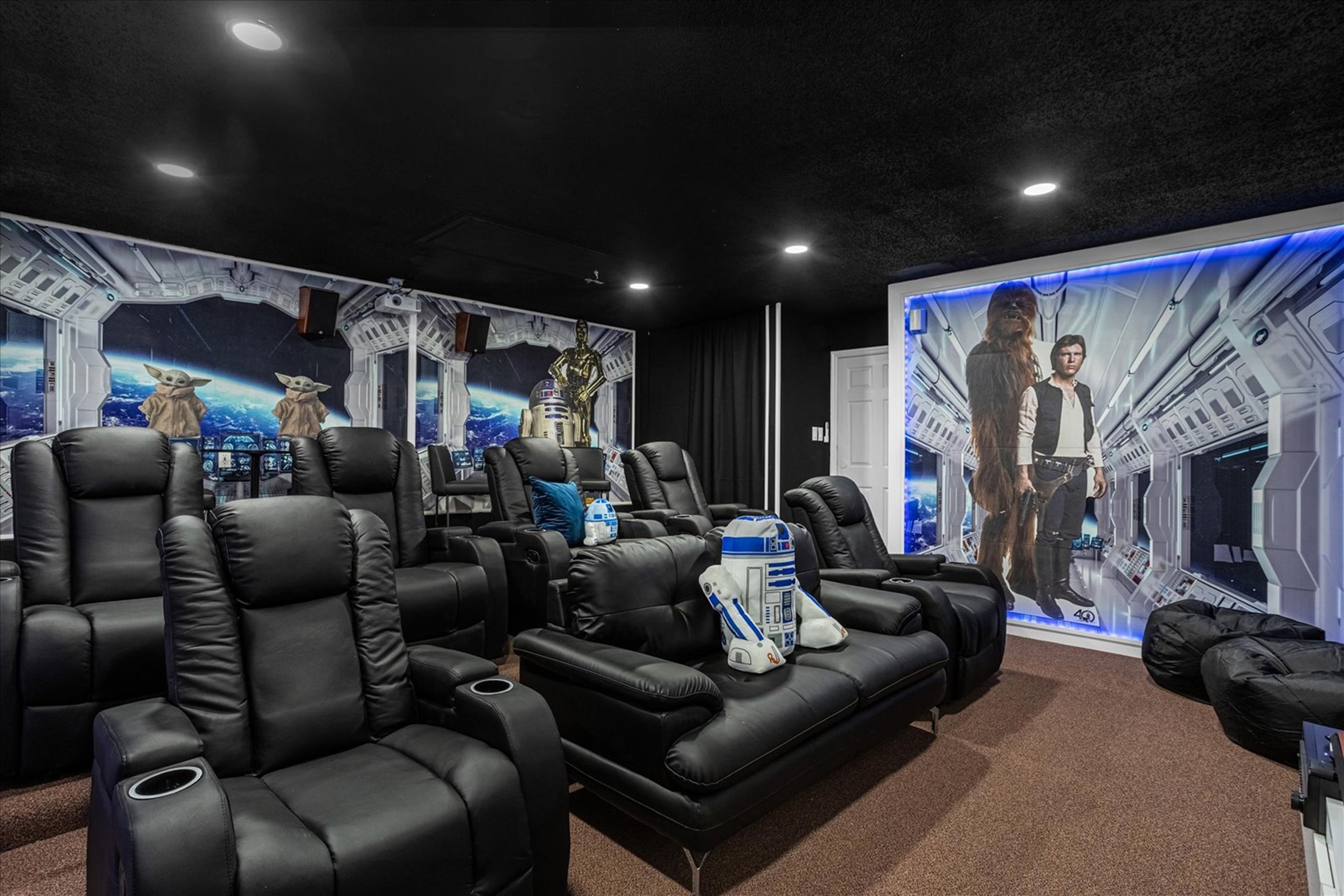 Bose surround sound 150"  theater with Roku streaming and Star Wars decor. 