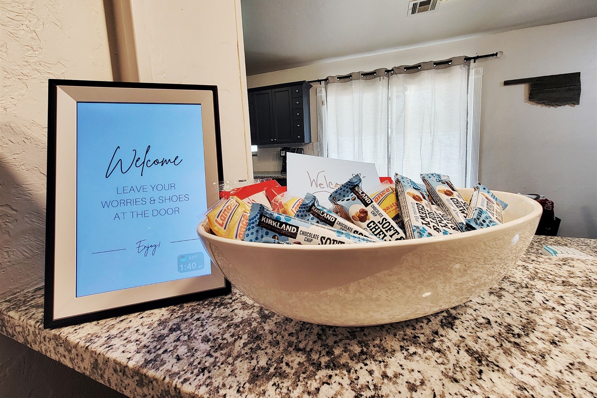 Welcome snacks and a photo frames that has answers to many FAQs