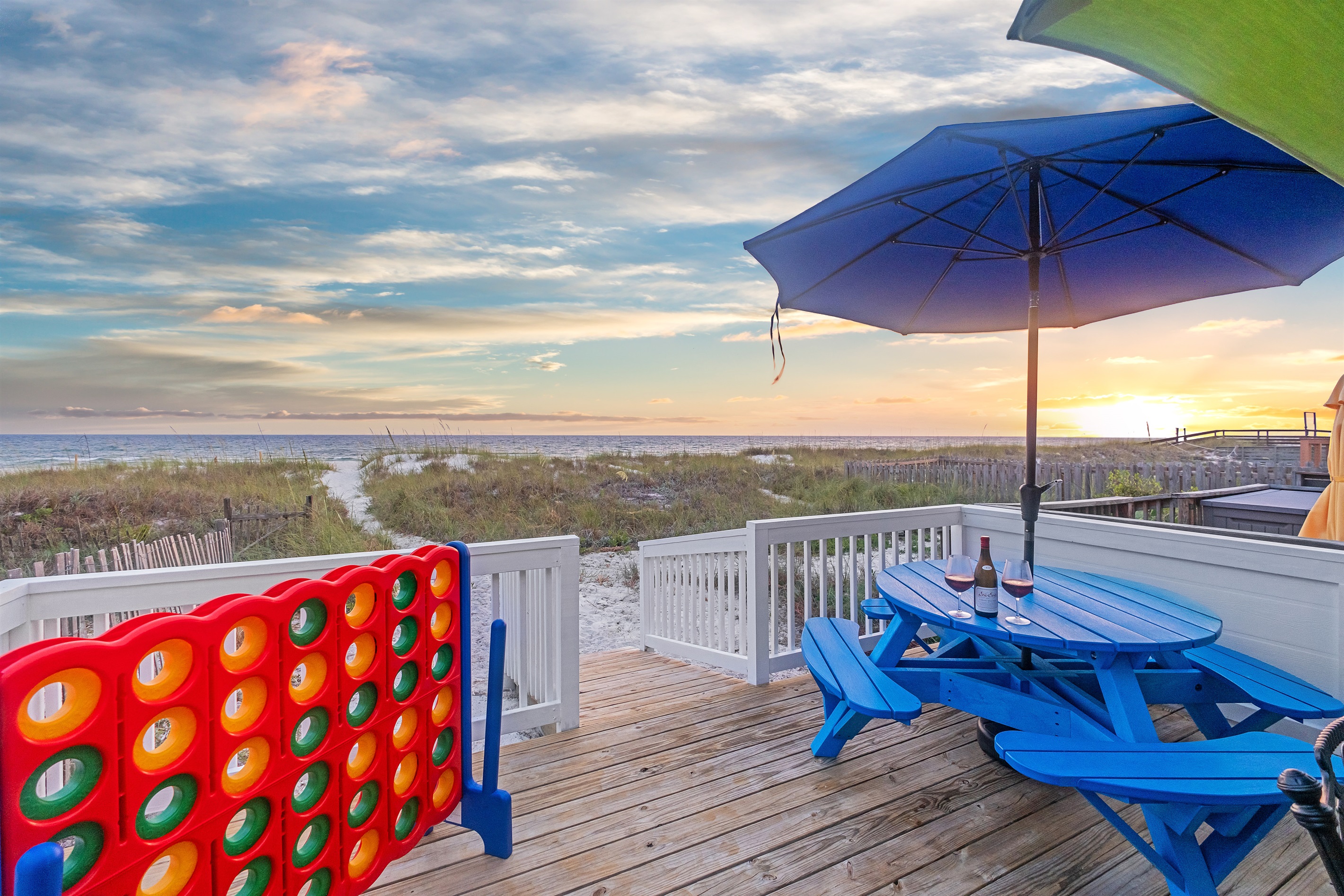 Enjoy a beachfront deck with games and stunning ocean views. Perfect for family fun and relaxation.