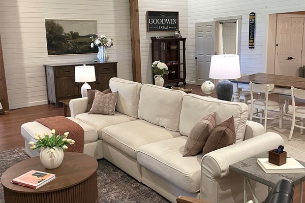 Comfortable living area with plush seating and a space to unwind.