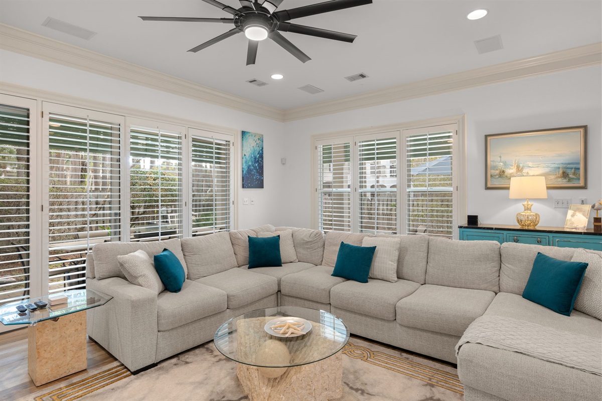 Unwind in style with natural light and the charm of plantation shutters.