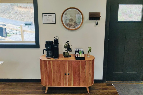 Welcome in and enjoy our coffee station with Keurig, drip coffee, and mugs.