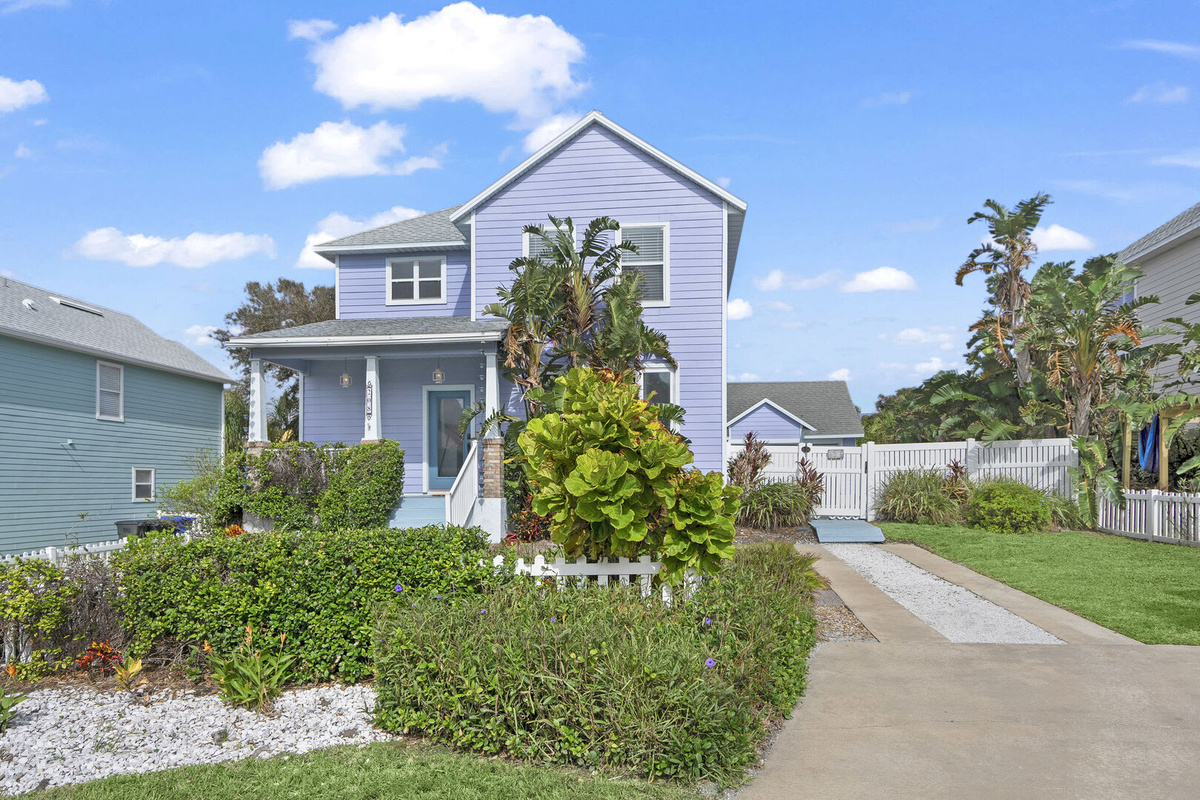 Driveway, hedging and the path up to the front door. The driveway holds two or three cars nose to tail; please do not park on the grass or on the street, as cars left there are liable to be towed away.