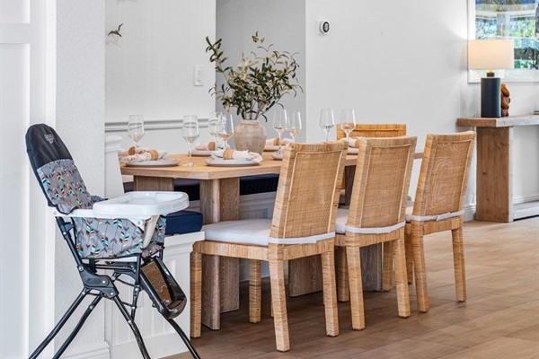 Thoughtfully designed for families, this inviting dining nook offers both sophistication and convenience for shared meals and special moments.