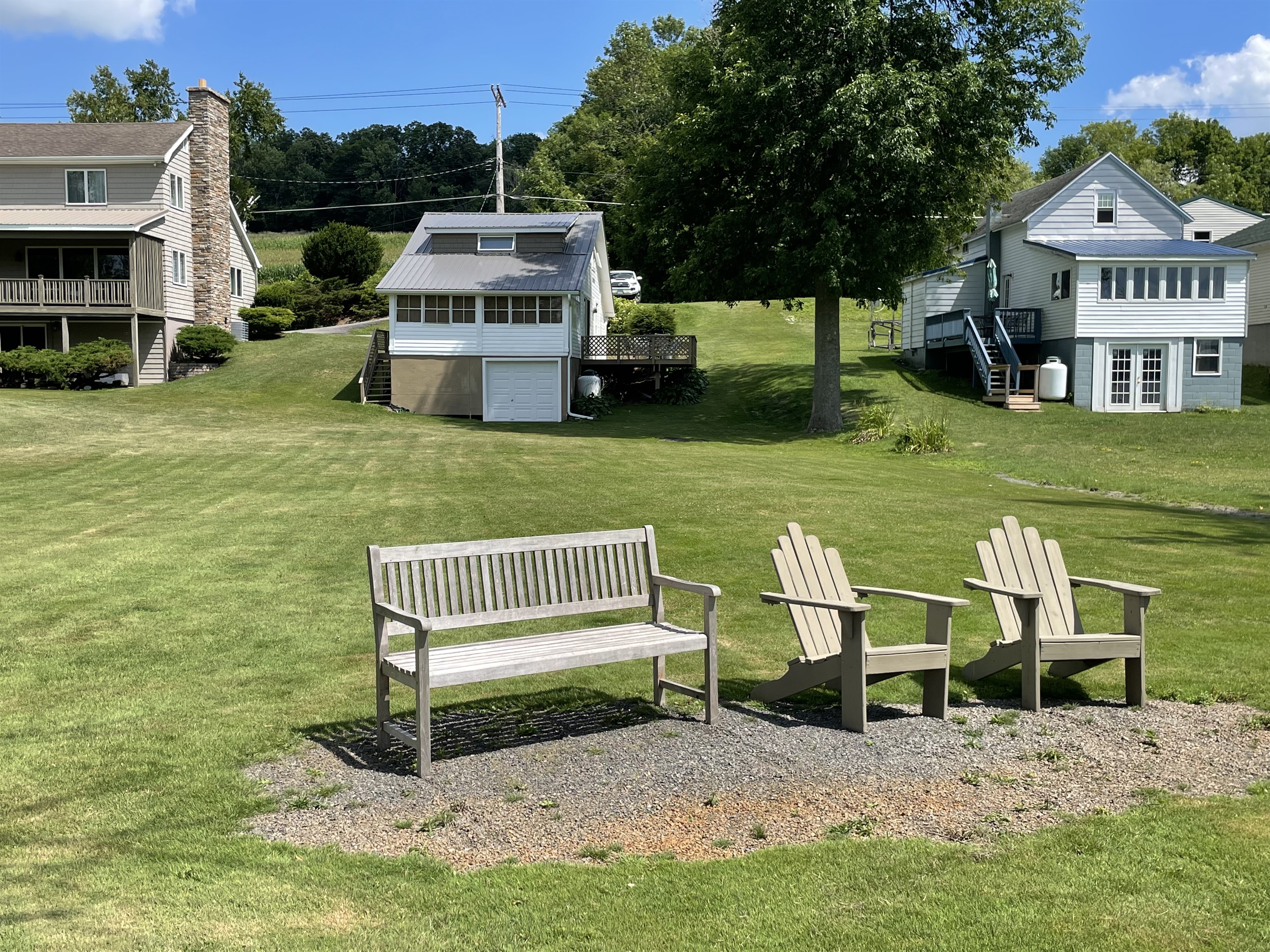Waterfront area with large level lawn to house
