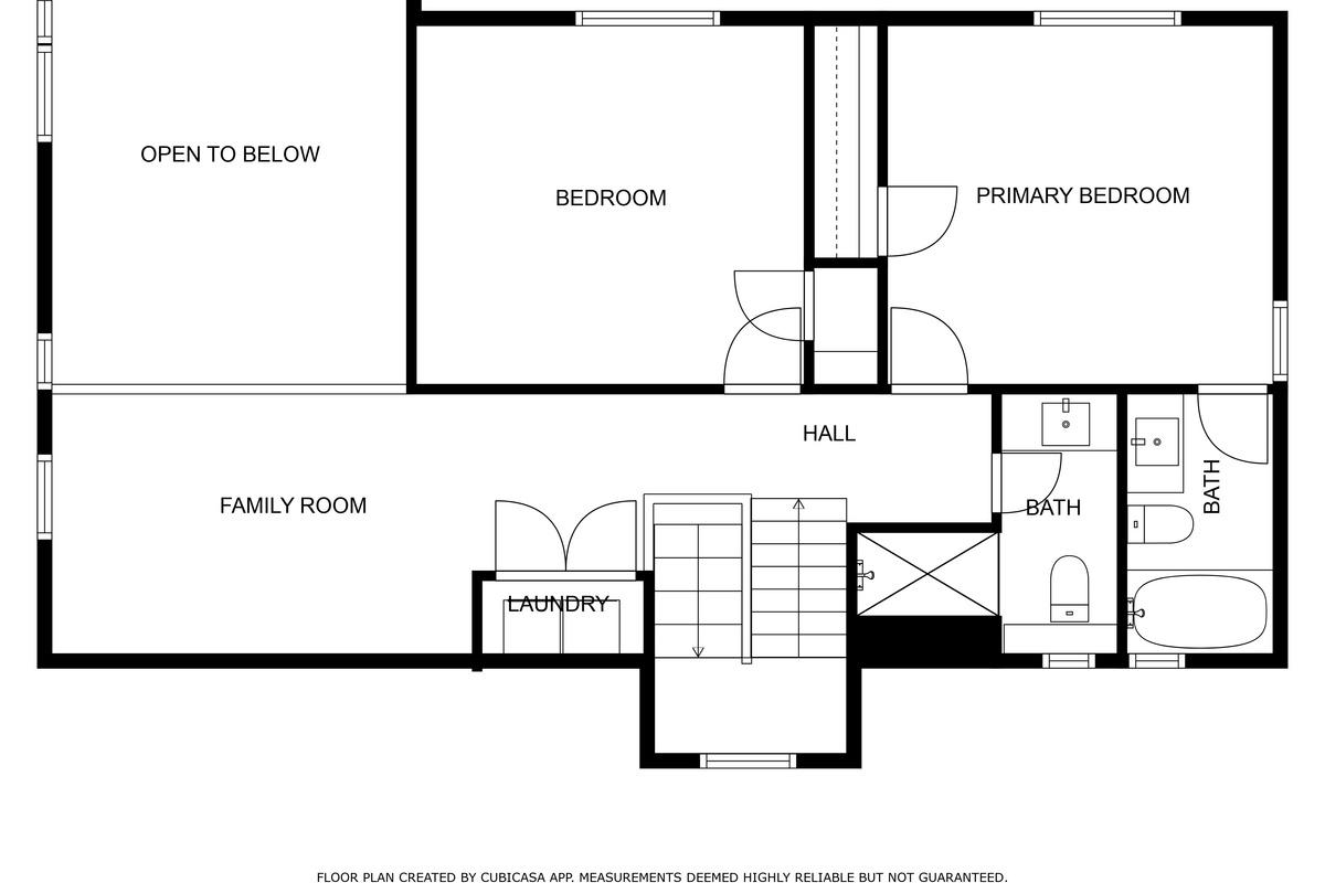 Upper level floor plan with the primary suite, second bedroom and family room
