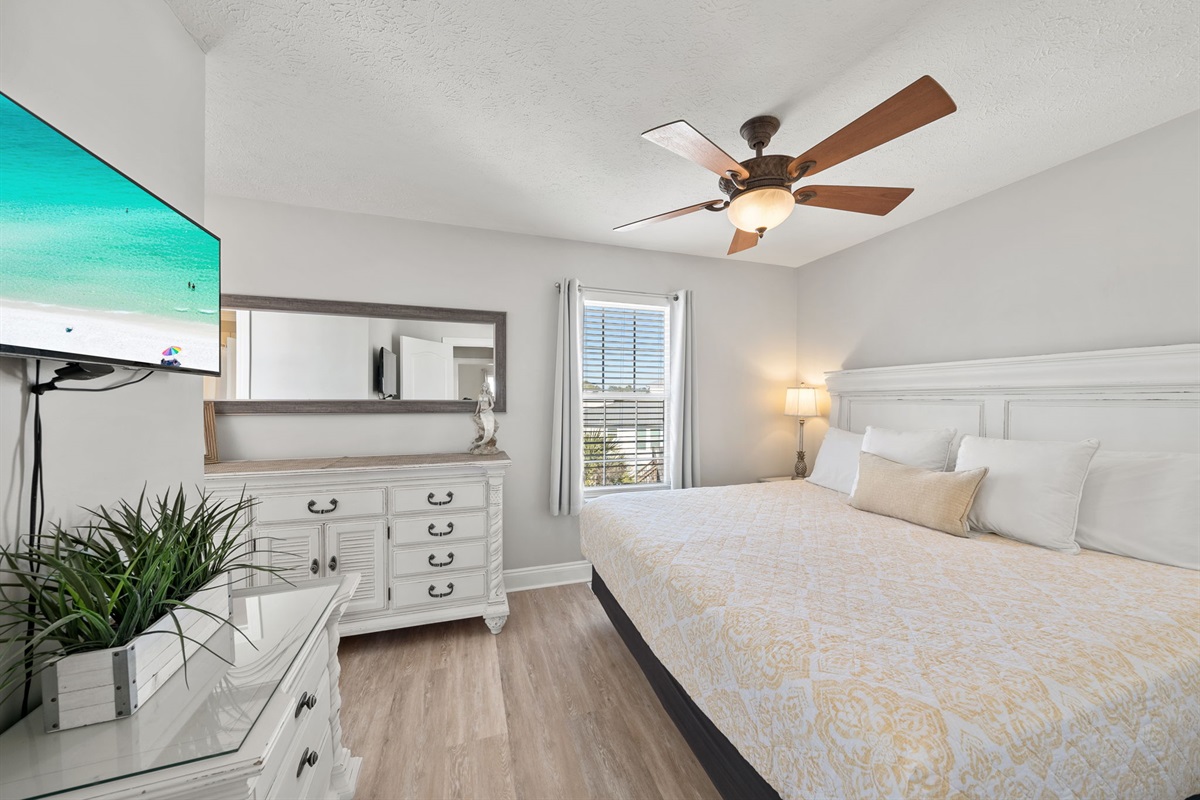 King bedroom that connects directly to the bathroom.