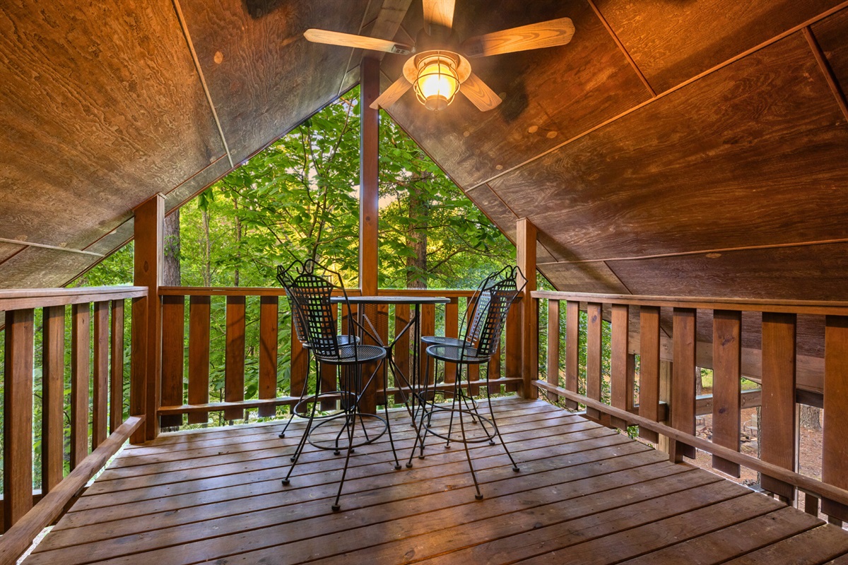 Upstairs balcony nook—ideal for coffee, wine, or quiet reading time.