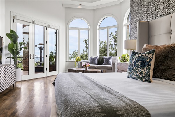 Bedroom 1 - King bed, Queen pullout, en-suite bathroom with access to the main patio.