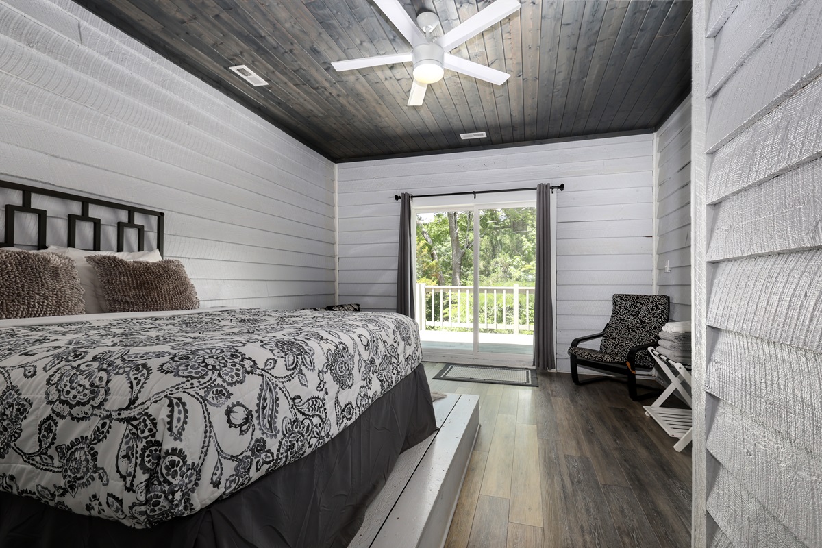 Bedroom 1 with Queen bed, access to deck and ensuite bathroom