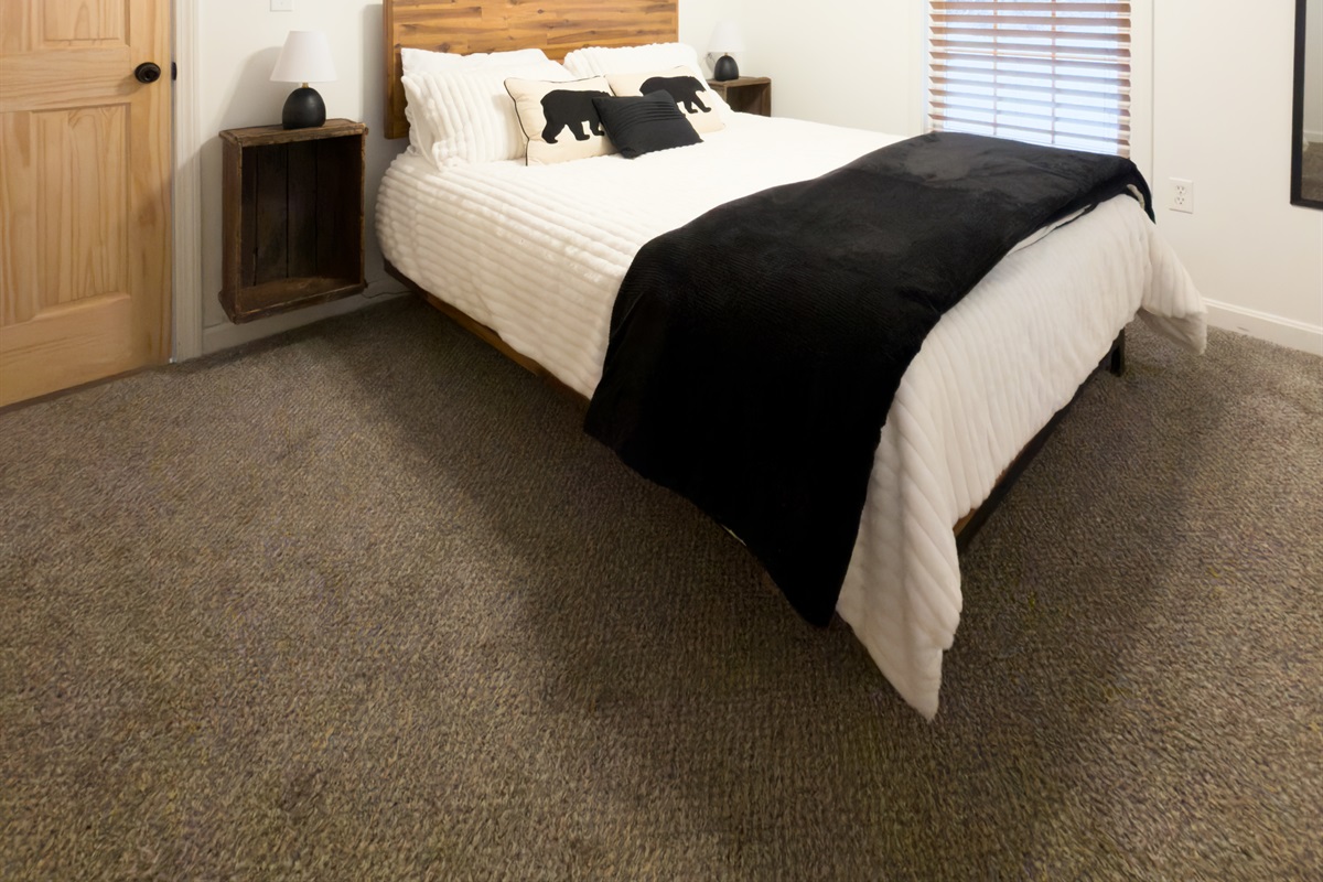 Bedroom 2  - Queen. Room is designed for comfort and charm. 