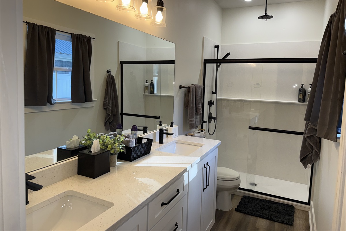 En-suite master bathroom includes a nice walk in shower and double sink. 