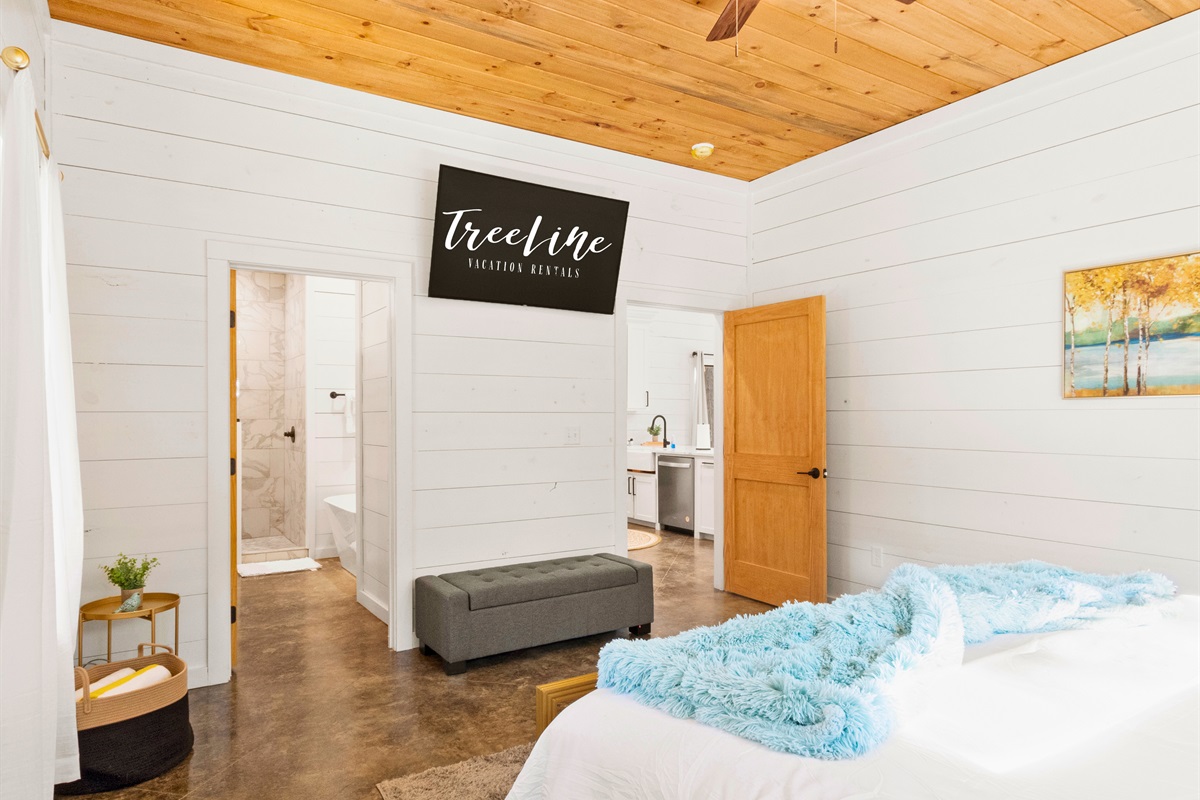 Dreamy retreat! Drift off in comfort in our spacious and serene bedroom.