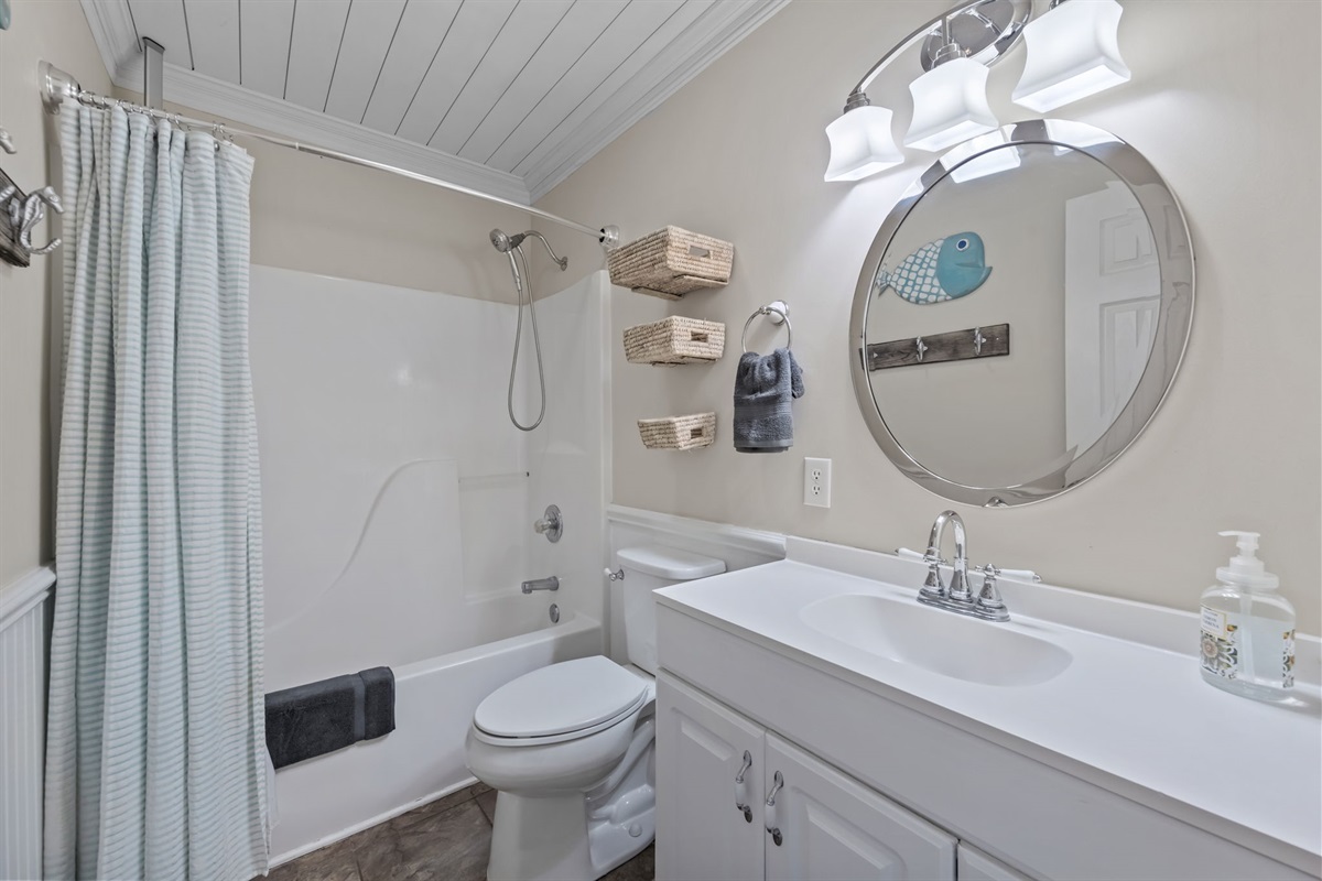 Upstairs bathroom with tub shower combo