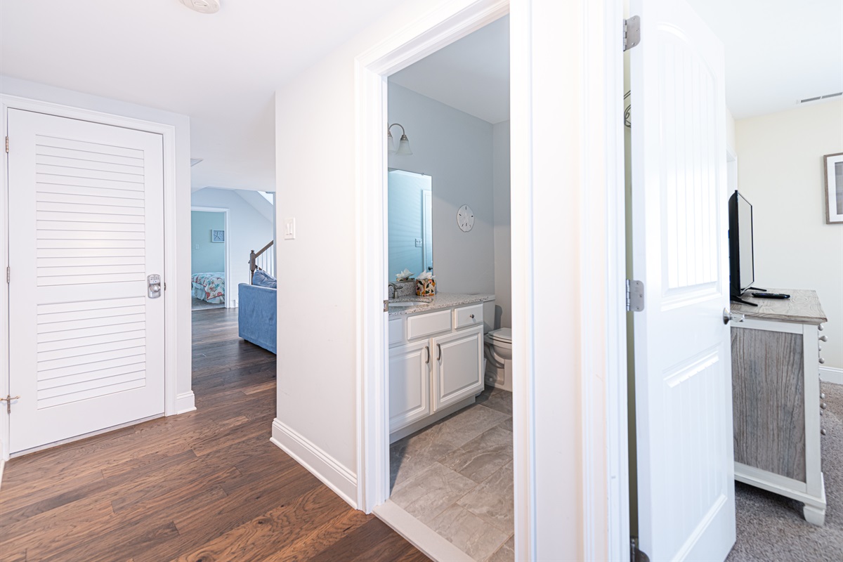 Hall with view of BR 2 and bath