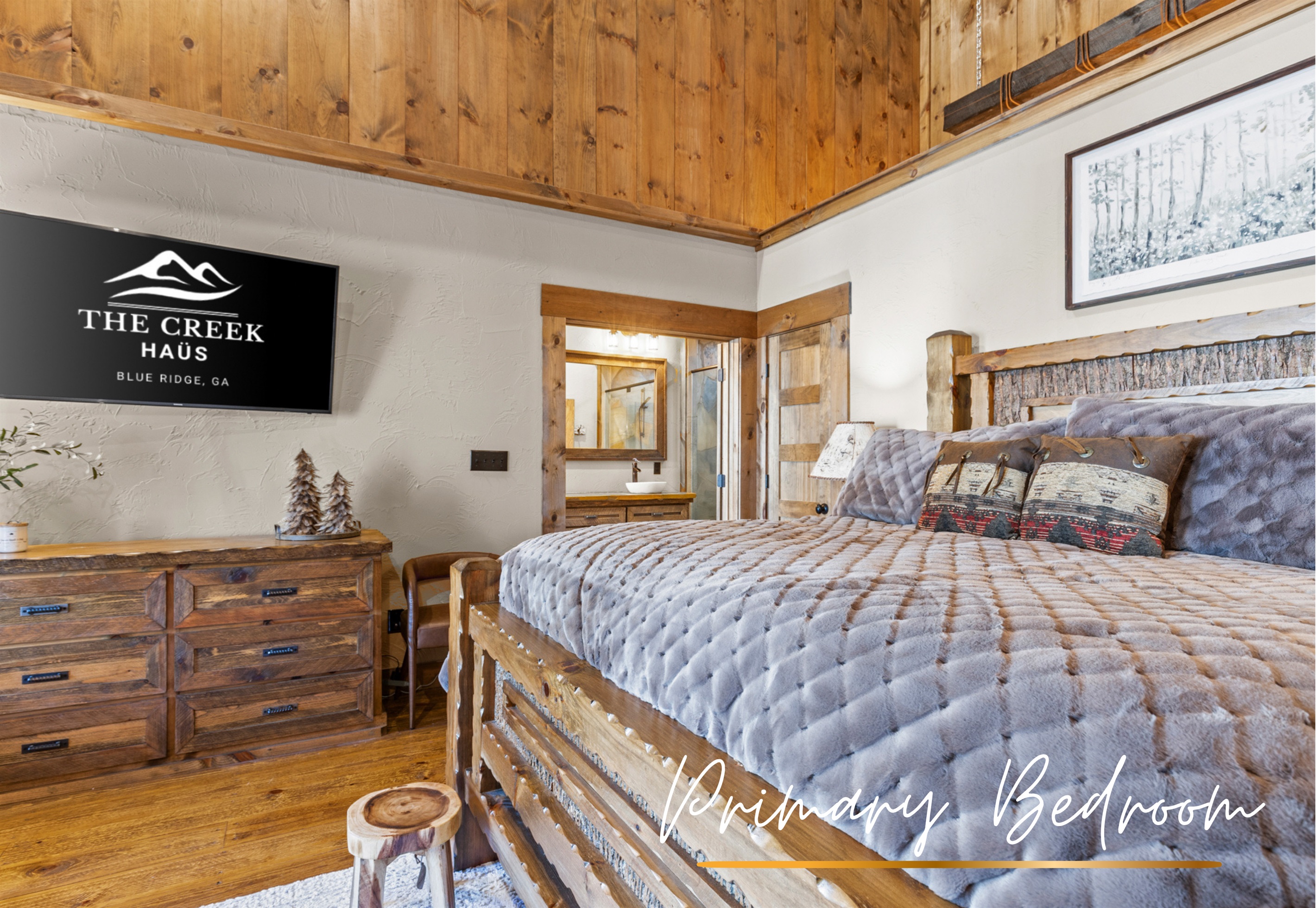 Bedroom1: Unwind in the comforts of the master suite, featuring a luxurious king-sized bed, rustic charm, and warm wood accents for a cozy, inviting retreat.