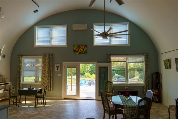View South to patio area. Generous covered porch & paver patio with fire pit. Yes, we stock S’more supplies! 
Photography is Emily’s, it is for sale. 