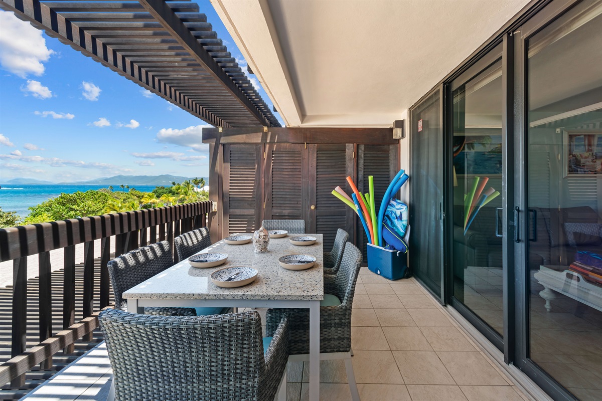 Dining space for 6 in this covered outdoor table.