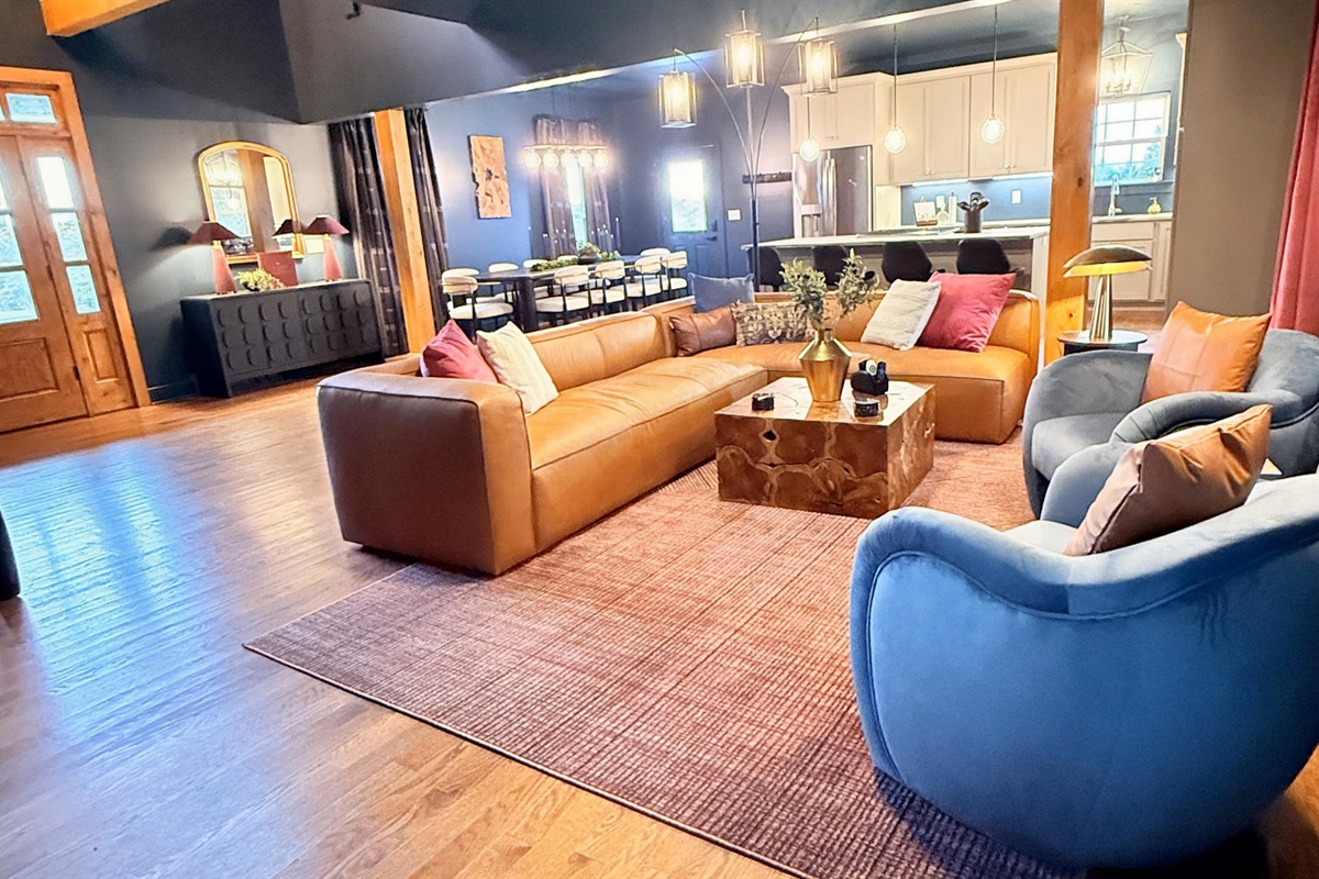 Open-concept warmth — the living and dining rooms flow together for conversation and connection.