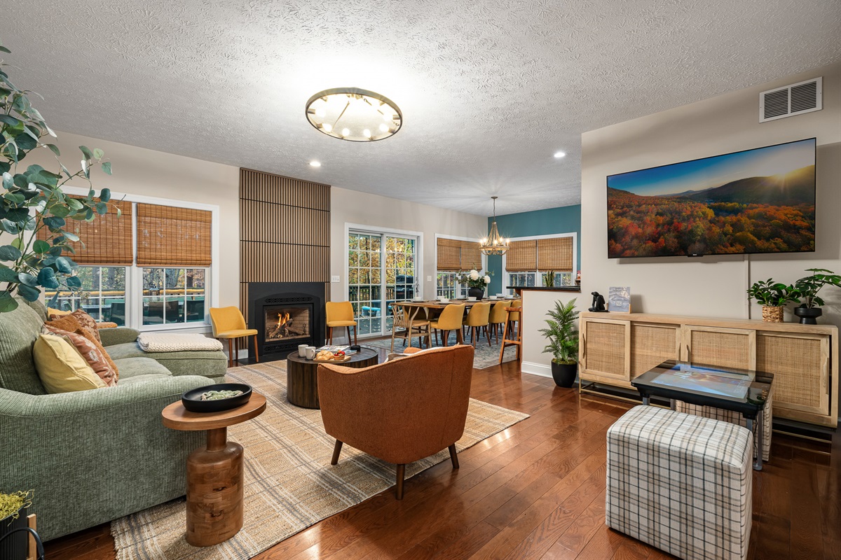 Bright, open living space with a cozy fireplace and plenty of room for everyone to gather. Whether it’s game night or wine night, this is the heart of the home.