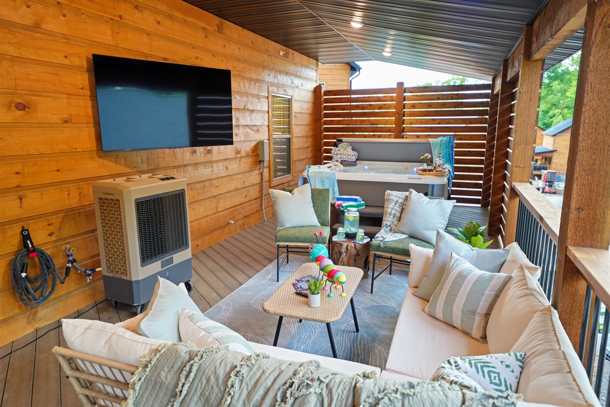 A large, covered, and screened in deck to enjoy time together outside - bug free!